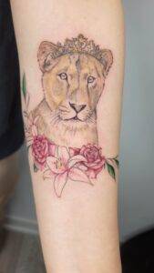 Exploring the Meaning Behind Lion Tattoos & 6 Popular Designs