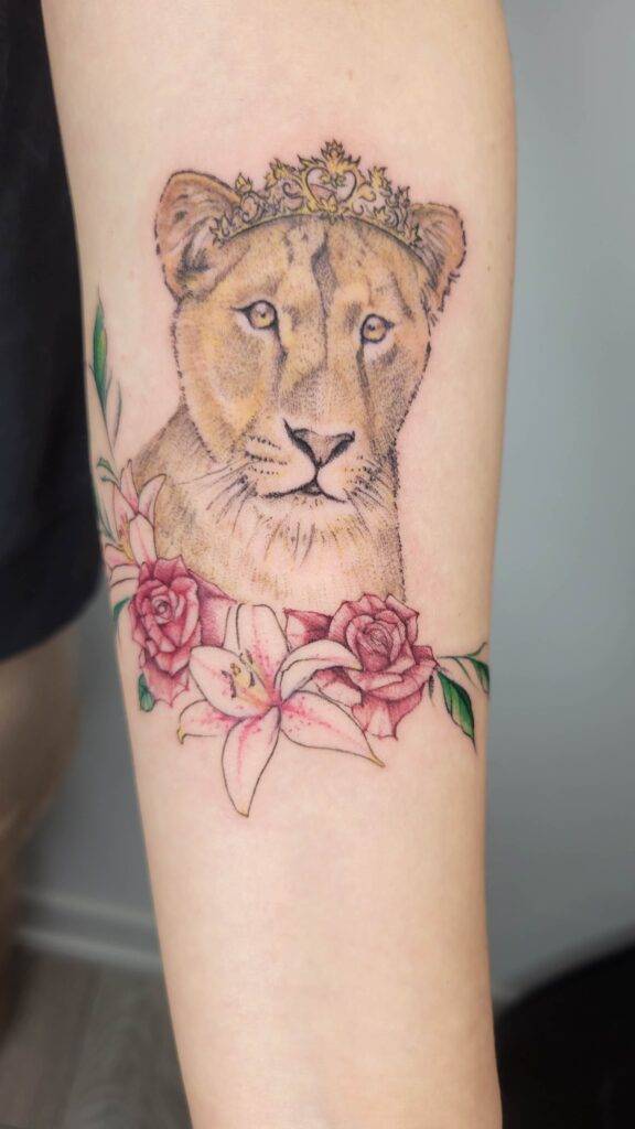 custom design lion tattoo with crown and flowers