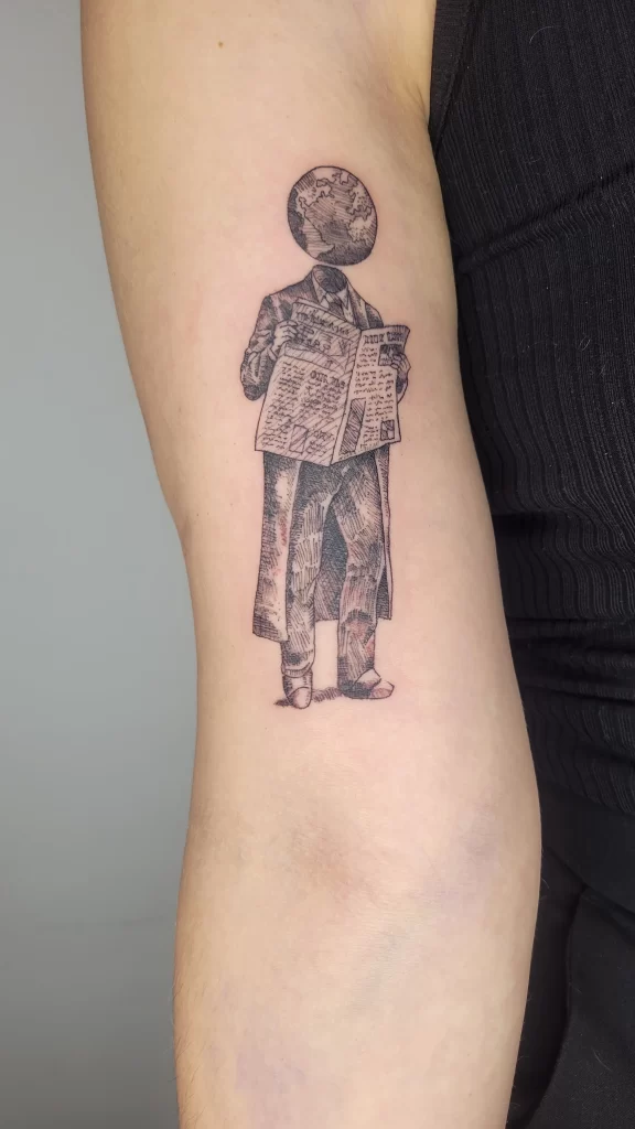 unique tattoo ideas done on a bicep of a female