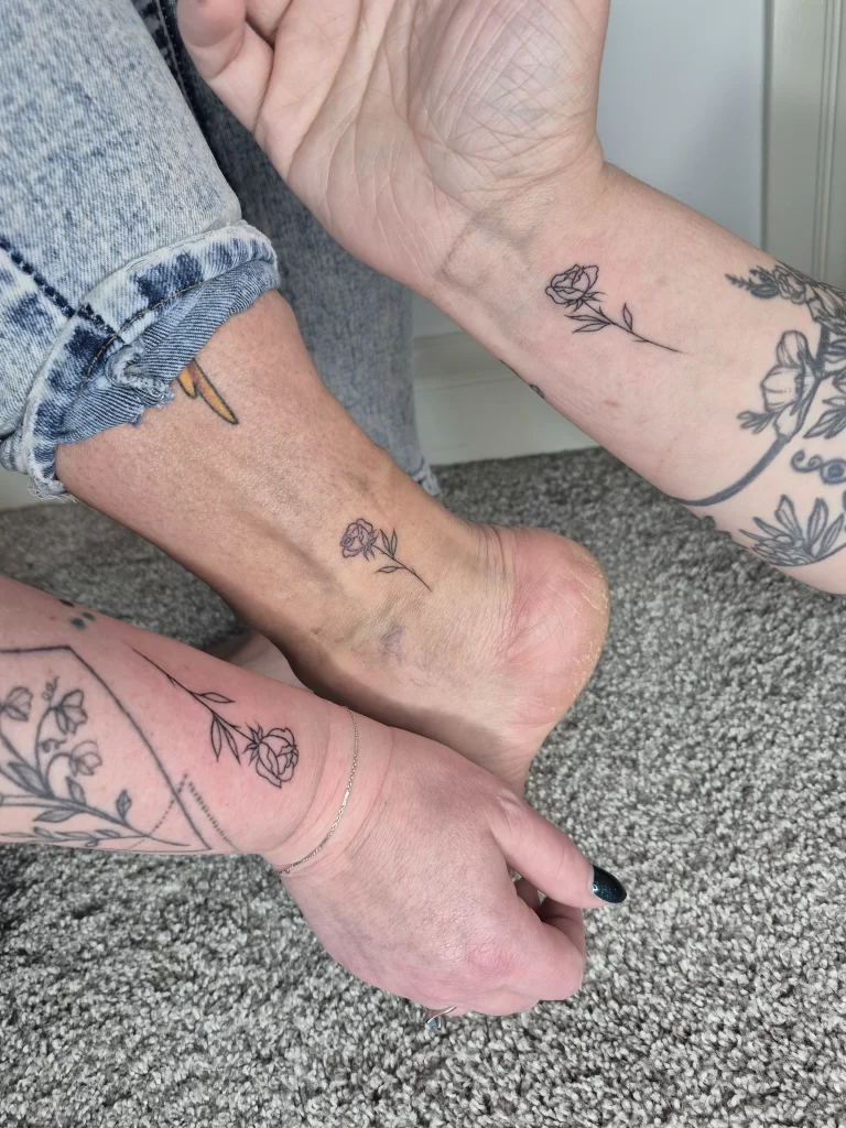 fine line floral tattoo design