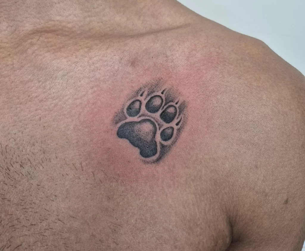 Memorial tattoo in Calgary featuring fine line floral elements, meaningful symbolism, and personalized tribute details created to honor the memory of a loved one.